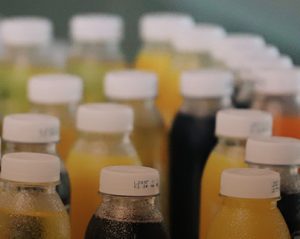 Various bottles of different colored liquids.