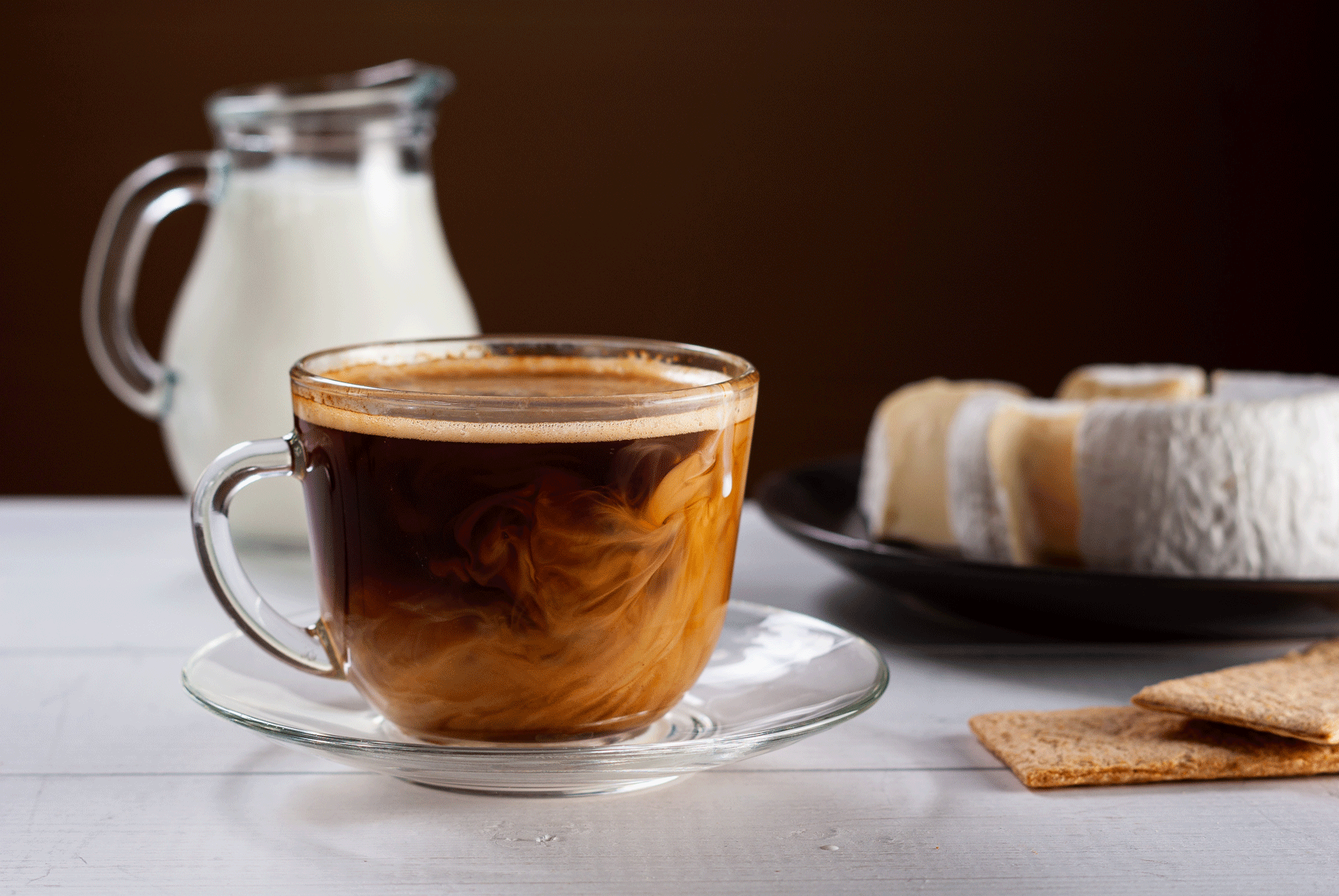 A cup of coffee sitting on top of a saucer