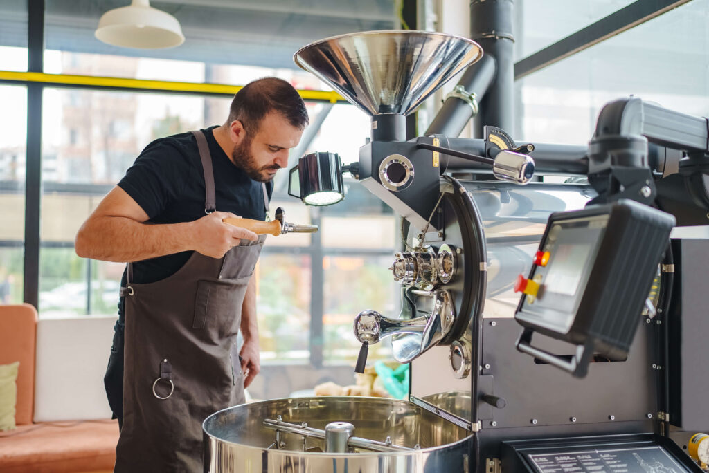 a man standing in front of a machine